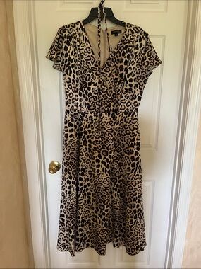 Tahari cheetah print surplus mini dress. Size 10.